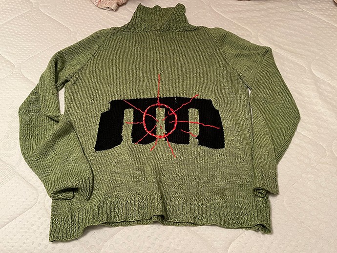 Strickpuli mit Stonehenge Motiv (vergrößerte Bildansicht wird geöffnet)